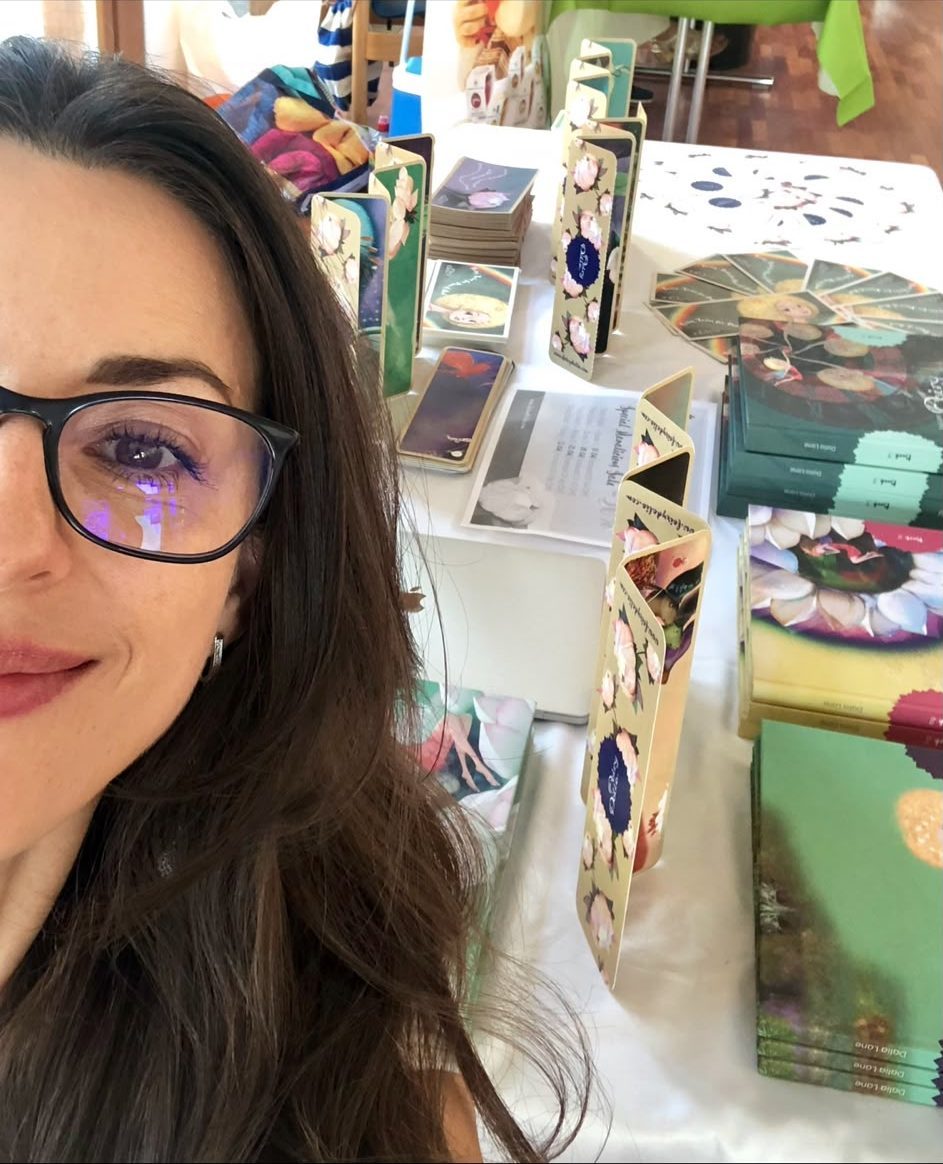 Dalia Lane at her Fairy Dalia stall, bookmarks and books on display